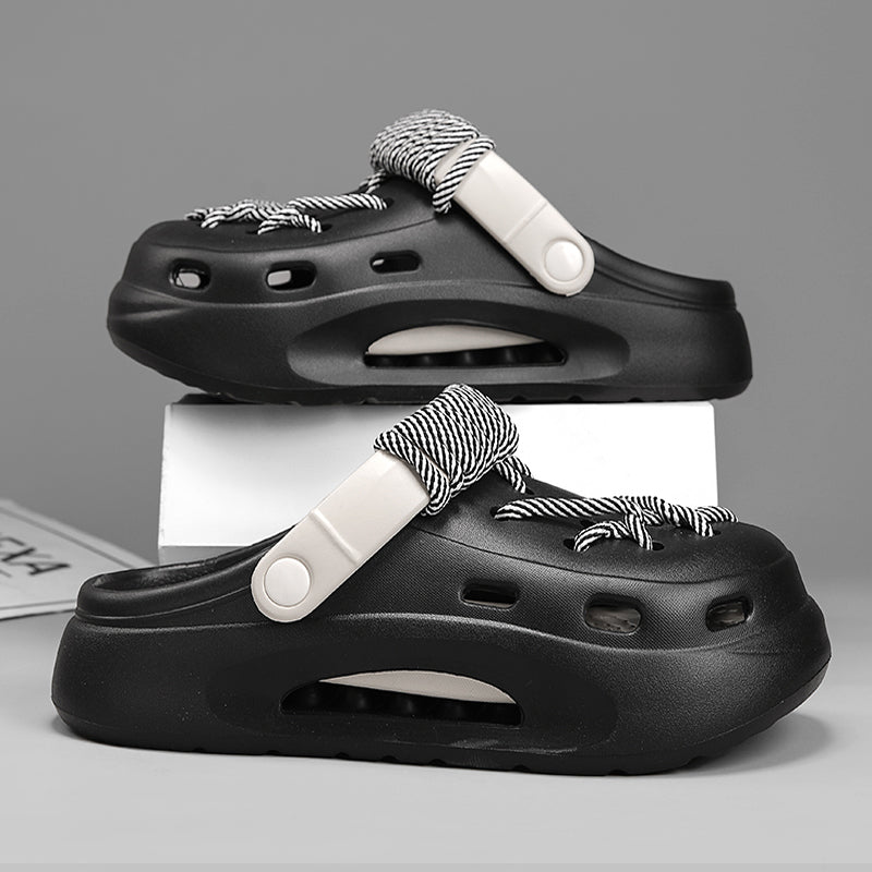 Pair of Ash Gray Women's Orbit Laced Clogs, side view showing breathable design & comfort.