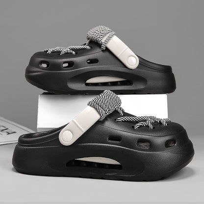 Pair of Ash Gray Women's Orbit Laced Clogs, side view showing breathable design & comfort.
