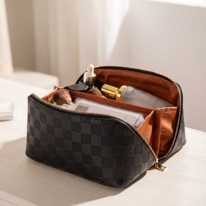 Brown women's vegan leather travel toiletry bag. Multi-compartment & water-resistant for cosmetics.