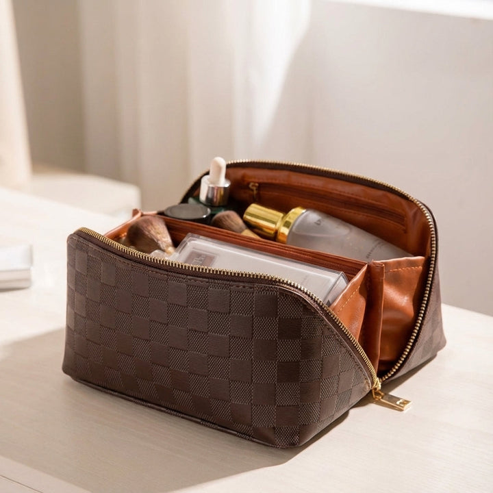 Elegant women's organized cosmetic pouch. Spill-resistant vegan leather for travel and daily essentials.