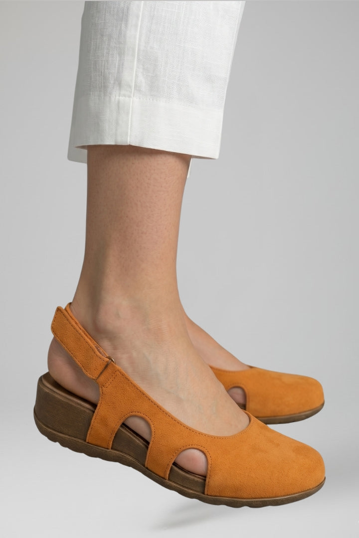 Ergonomic women's orthopaedic sandals featuring adjustable straps for custom fit & arch support.