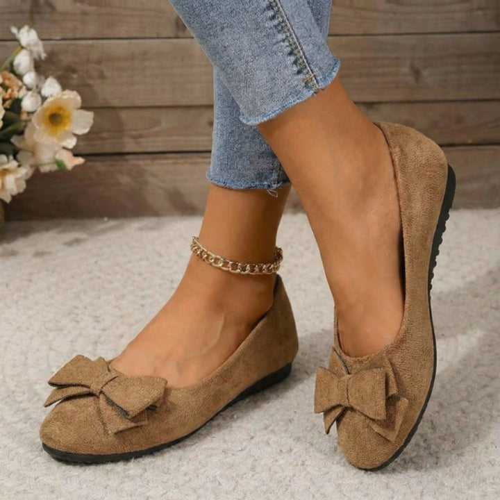 Ladies' comfortable wide fit ballet flats, featuring orthopaedic arch support and cushioned sole.