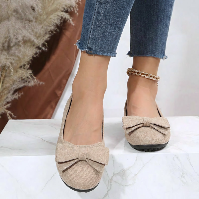 Lightweight women's wide fit ballet flats with orthopaedic footbed for superior comfort.