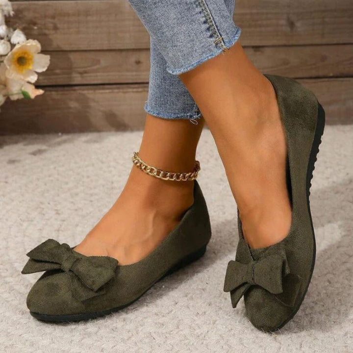 Classic black wide fit ballet shoes for women, featuring orthopaedic support and ultimate comfort.
