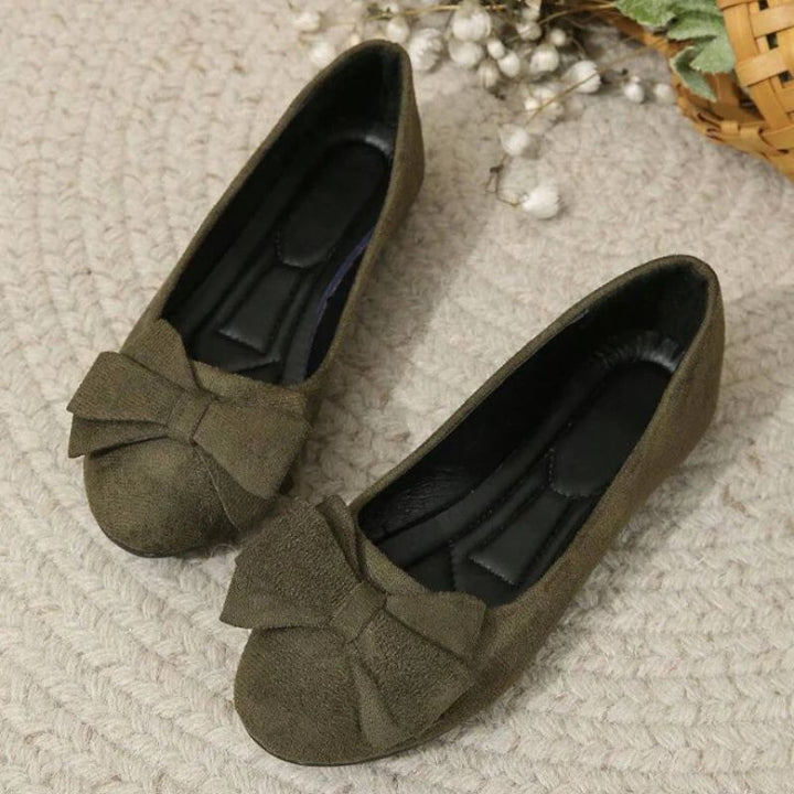 Stylish women's wide fit ballet flats with orthopaedic cushioning for foot support.