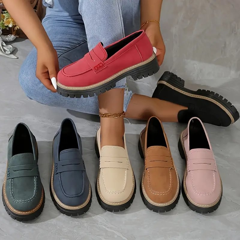 Classic black orthopaedic slip-on loafers for women, featuring a comfort wide toe box & support.