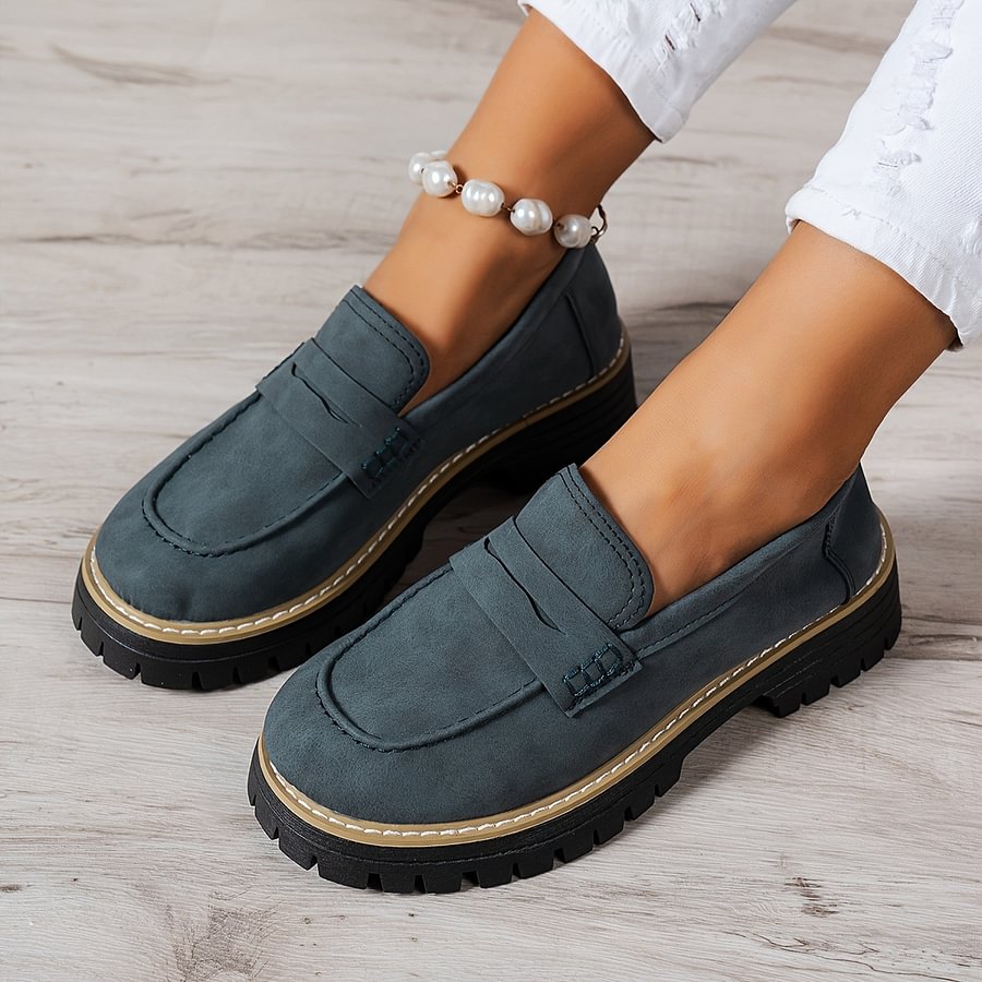 Black casual slip-on loafers for women, offering orthopaedic support & a wide toe box.