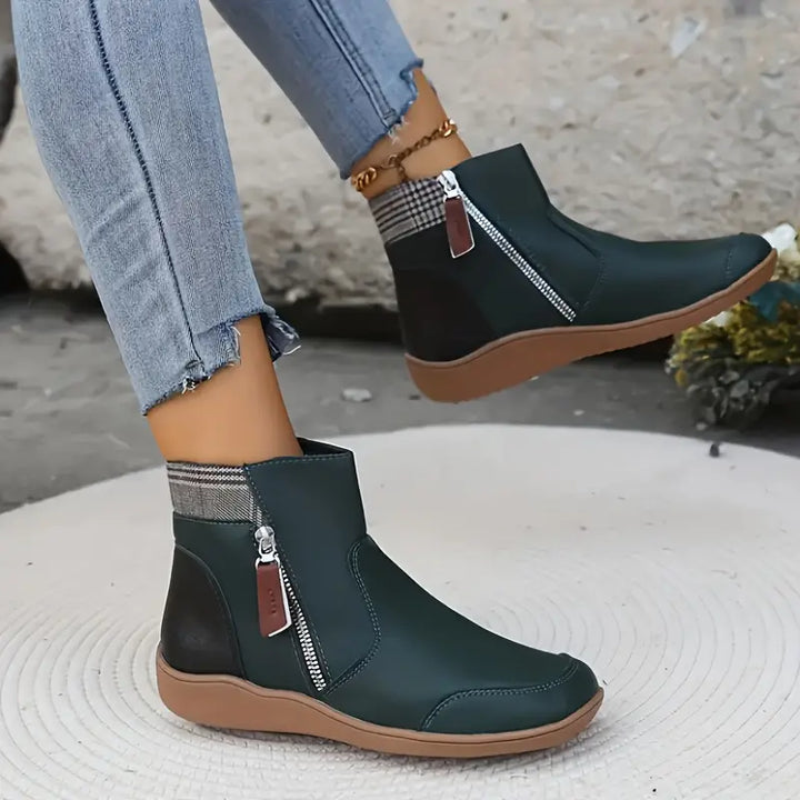Women's orthopedic zipper ankle boots, providing supportive footwear for daily wear.