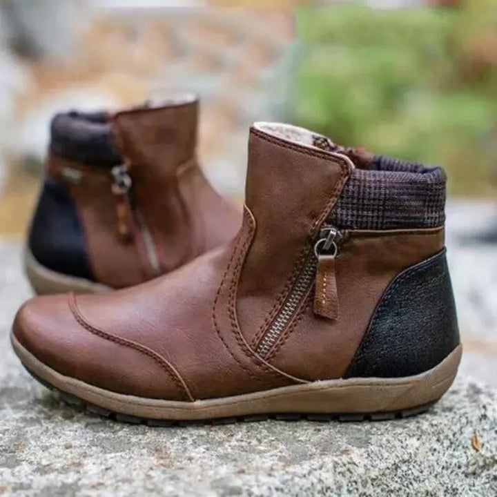 Women's supportive orthopedic ankle boots, designed for arch comfort and stability.