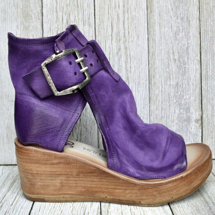 Women's boho wedge sandals featuring an adjustable buckle and orthopedic arch support.