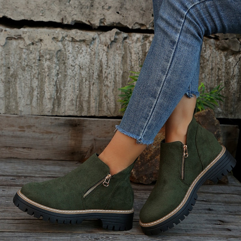 Side profile of women's supportive boots, featuring orthopedic comfort technology.