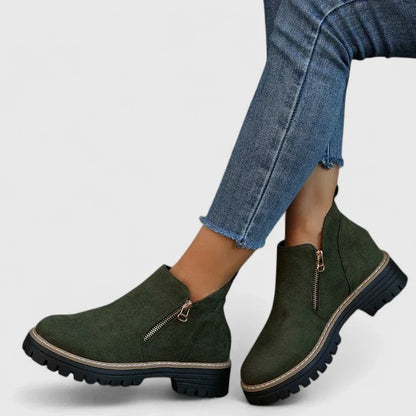Detail of the arch support in women's orthopedic walking boots for superior comfort.