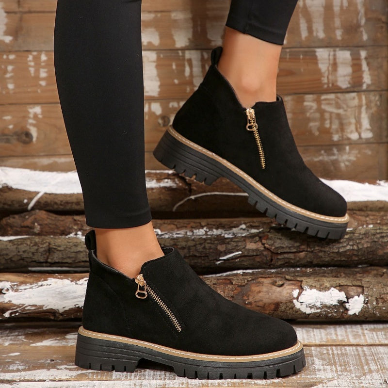 Black women's orthopedic boots with slip-resistant sole, ideal for winter walks.
