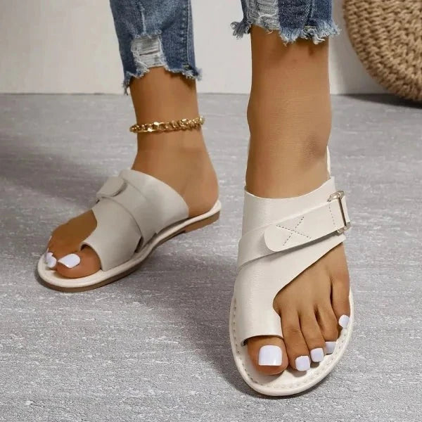 Orthopedic women's sandals designed for bunion correction, providing arch support & comfort.