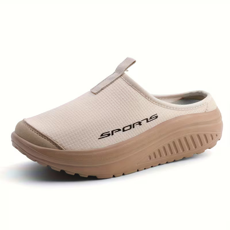 Women's orthopedic closed toe slip-on slippers in gray, offering comfortable arch support for indoor wear.