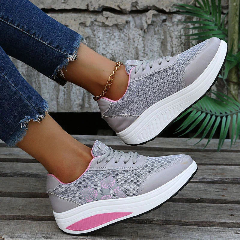 Women's comfortable footwear: corrective orthopedic sneakers for walking, providing comprehensive posture support.