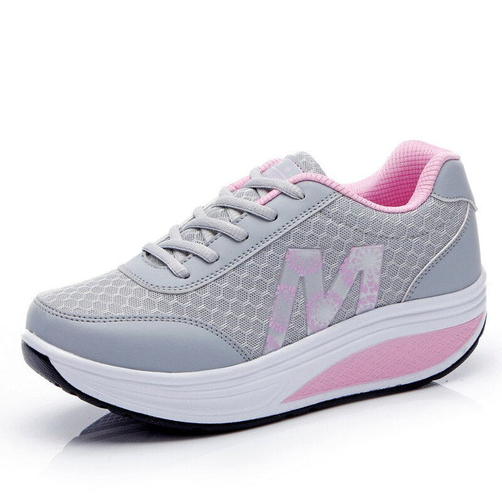 Supportive women's footwear: corrective walking sneakers with arch support for active pain relief.