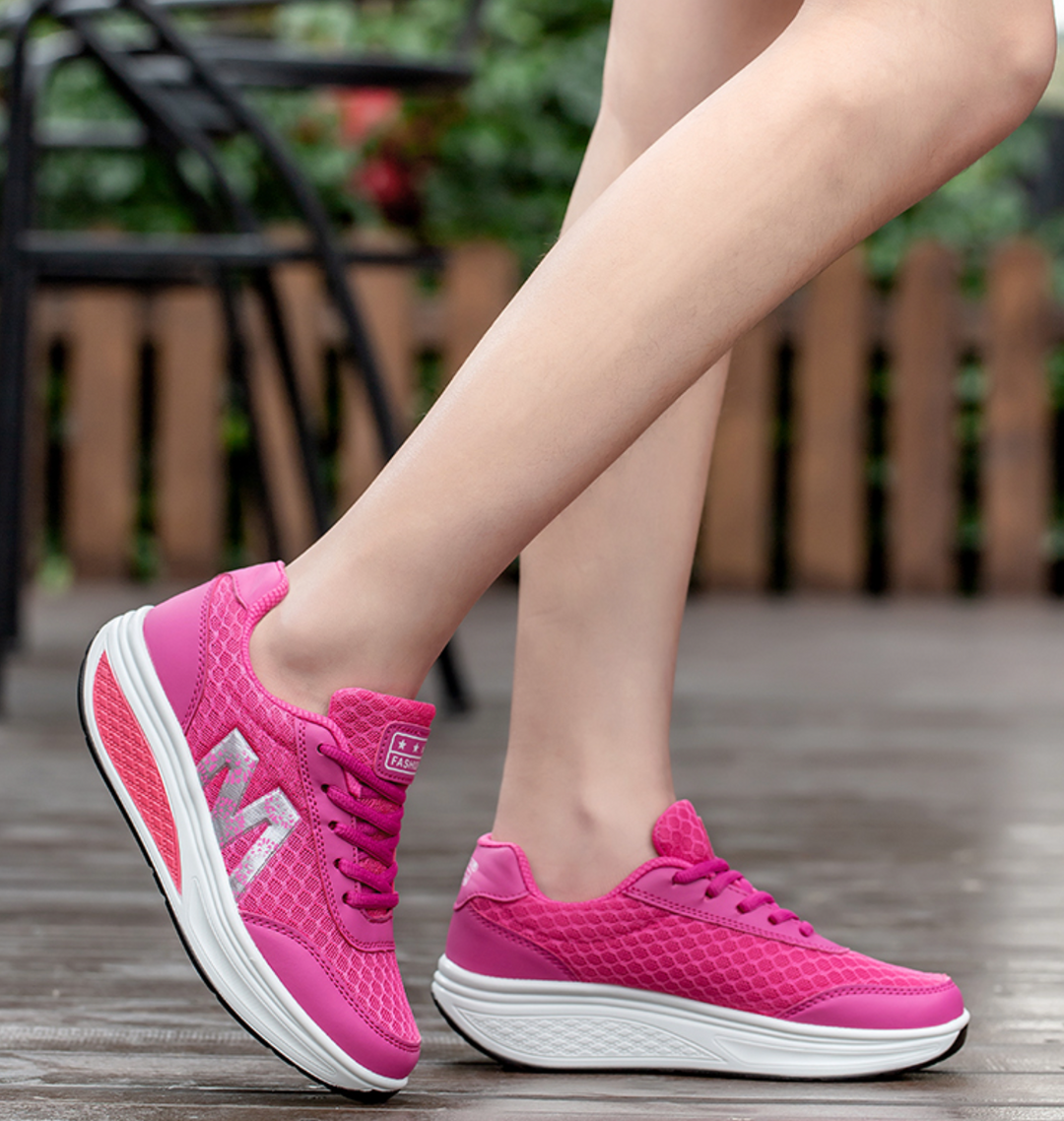 Orthopedic women's sneakers with advanced arch support for improved posture & comfortable walking.