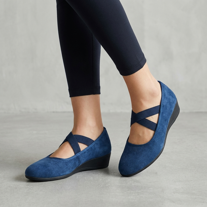 Women's orthopedic criss-cross strap flats with a comfortable wedge heel. Perfect versatile summer footwear.