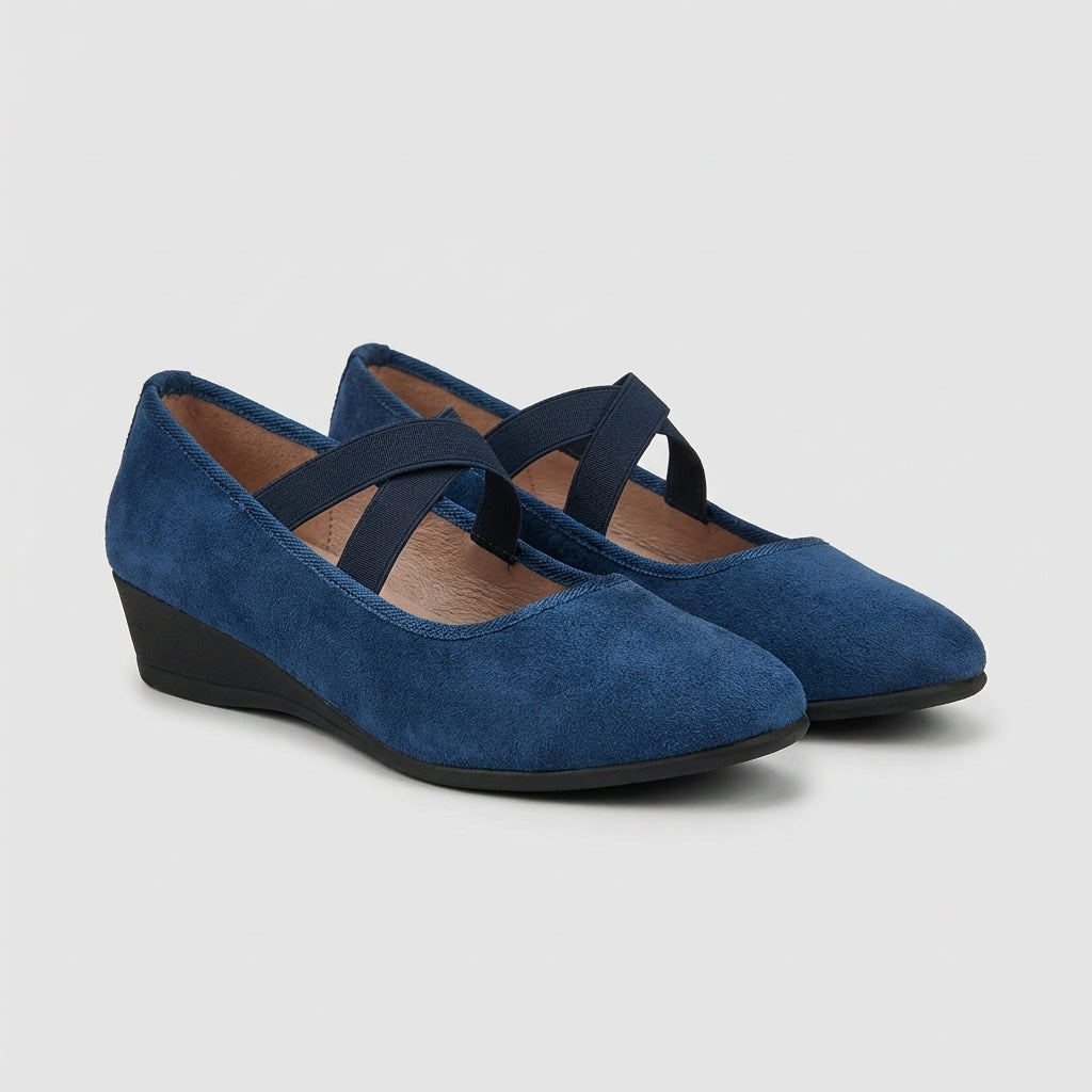Elegant women's orthopedic criss-cross wedge flats with supportive straps. Comfortable summer footwear for all-day comfort.
