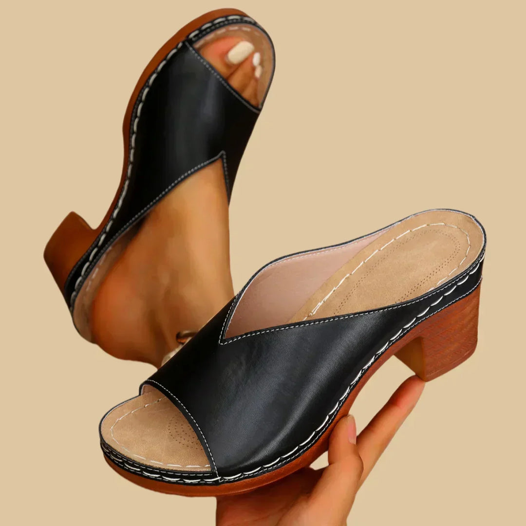 White orthopedic flat sandals for women, designed for all-day comfort, arch support, and summer style.