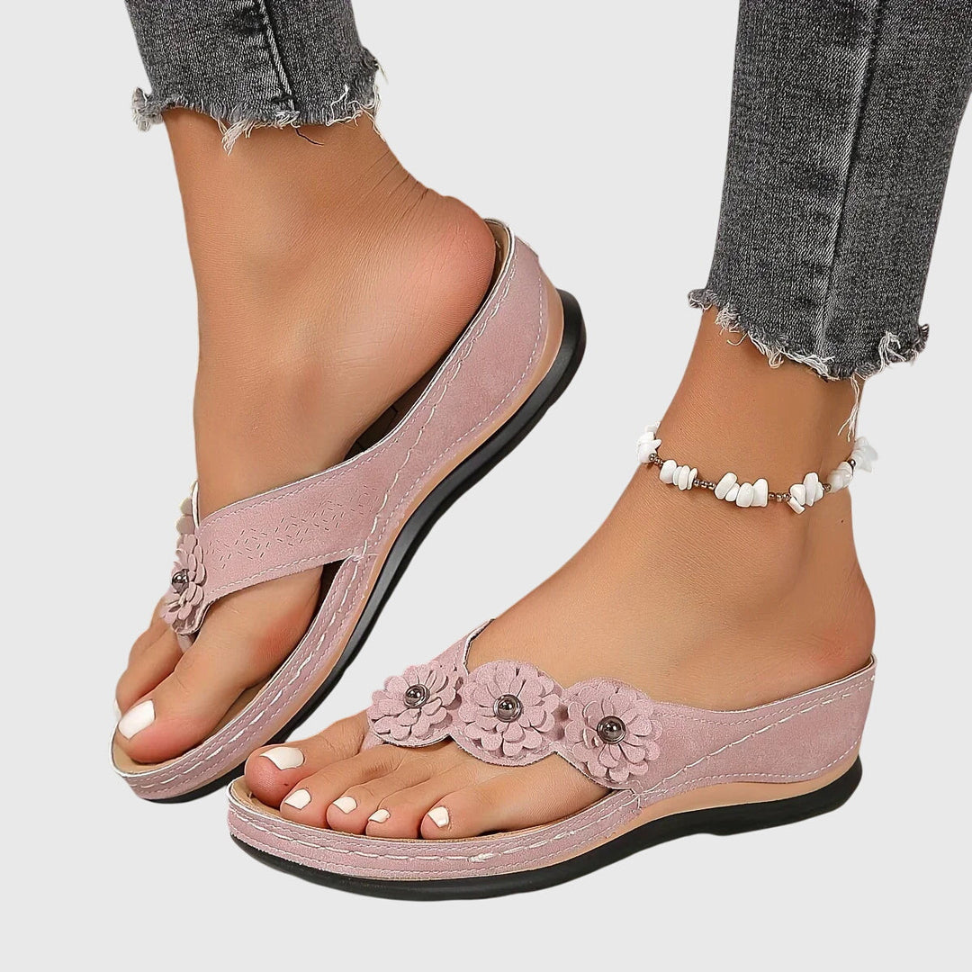 Lightweight orthopedic flip flops, perfect for women seeking all-day arch support & comfort.