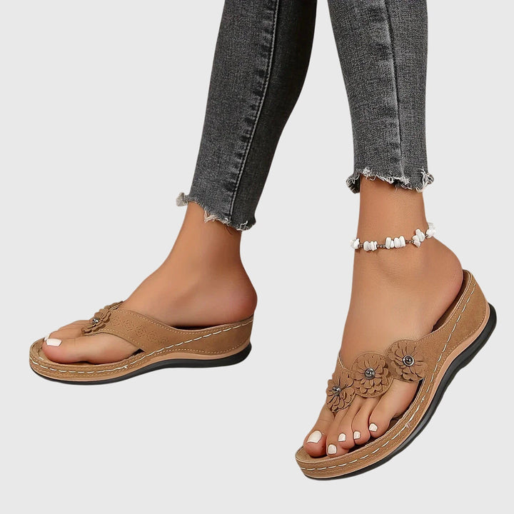 Pair of comfortable women's sandals, designed for all-day wear with orthopedic support.