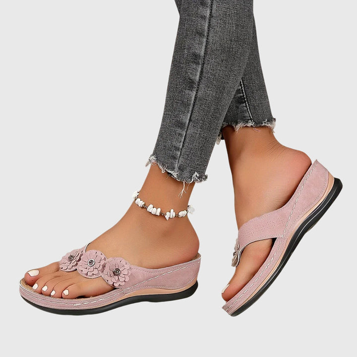 Women's lightweight flip flops providing excellent arch support and shock absorption.