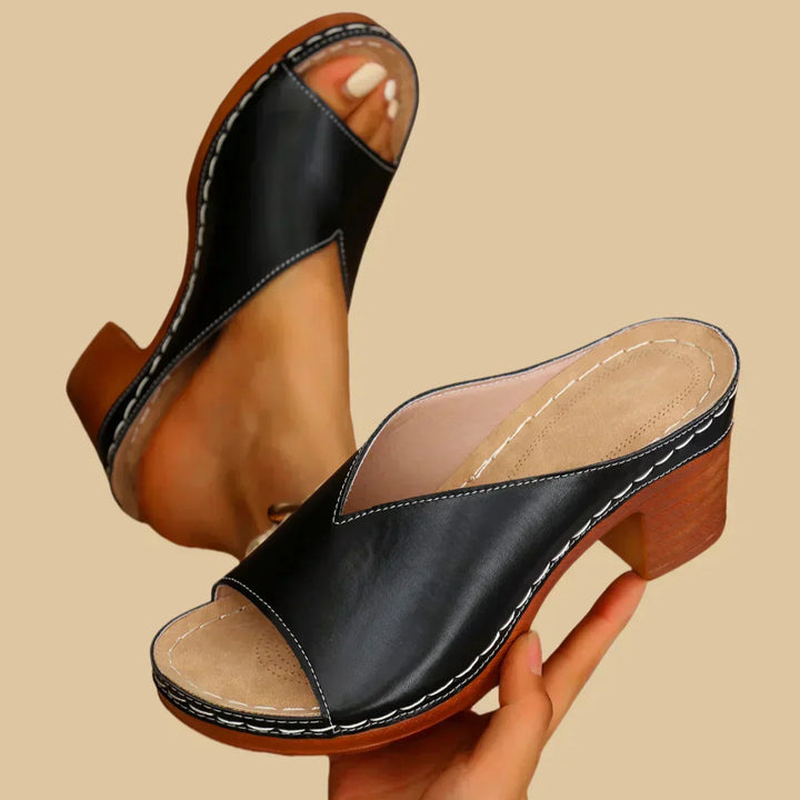 Tan leather orthopedic heeled sandals for women, designed for all-day comfort and stylish foot support.