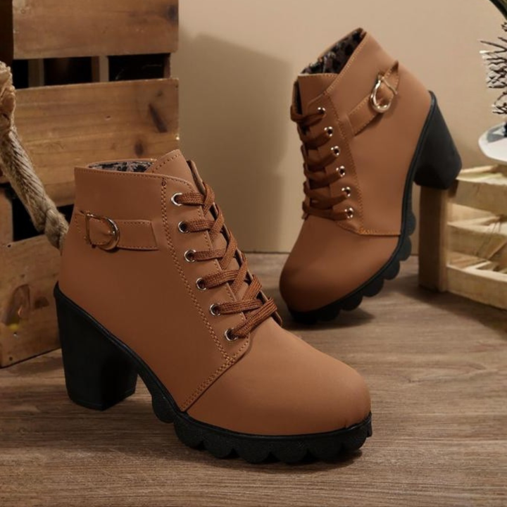 Stylish orthopedic ankle boots for women, featuring arch support & comfortable block heel. Perfect everyday wear.