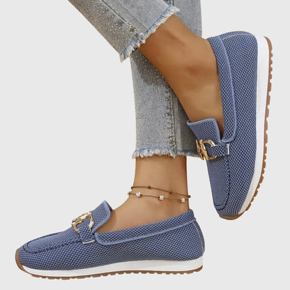 Gray women's orthopedic fashion sneakers. Comfortable slip-on loafers for casual elegant style.