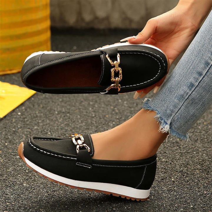 Women's health-focused loafers, engineered with orthopedic arch support.