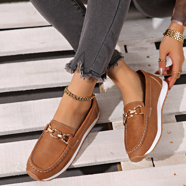 Women's supportive loafers, ideal for casual wear with built-in arch support.