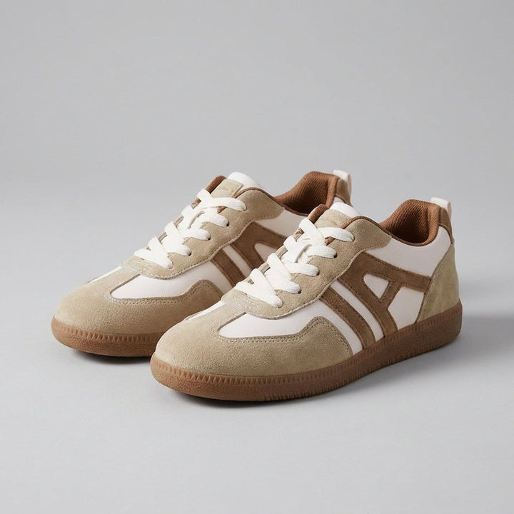 Stylish women's low-top comfort sneakers for everyday wear. Athletic casual design with orthopedic support for active women.