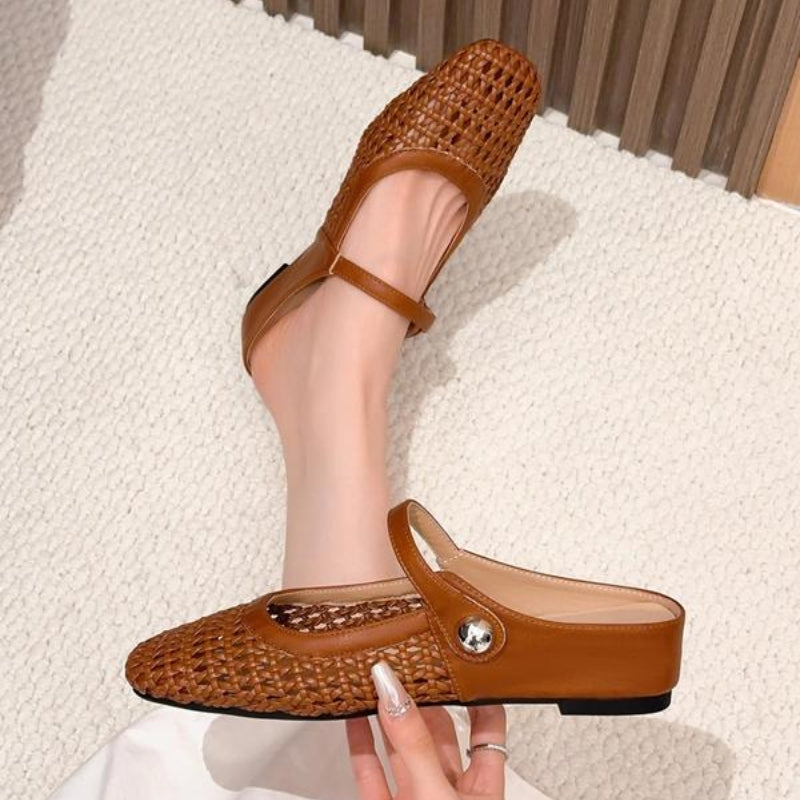 Lightweight women's orthopedic mule flats, offering essential arch support for daily comfort.