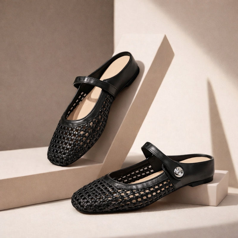 Women's orthopedic walking mule flats, offering comfortable arch support for everyday steps.