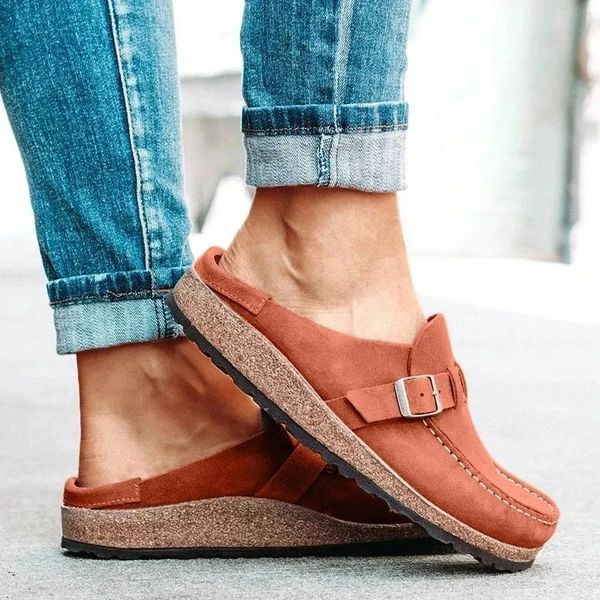 Modern women's orthopedic mules, providing cushioned comfort & backless easy-wear design.
