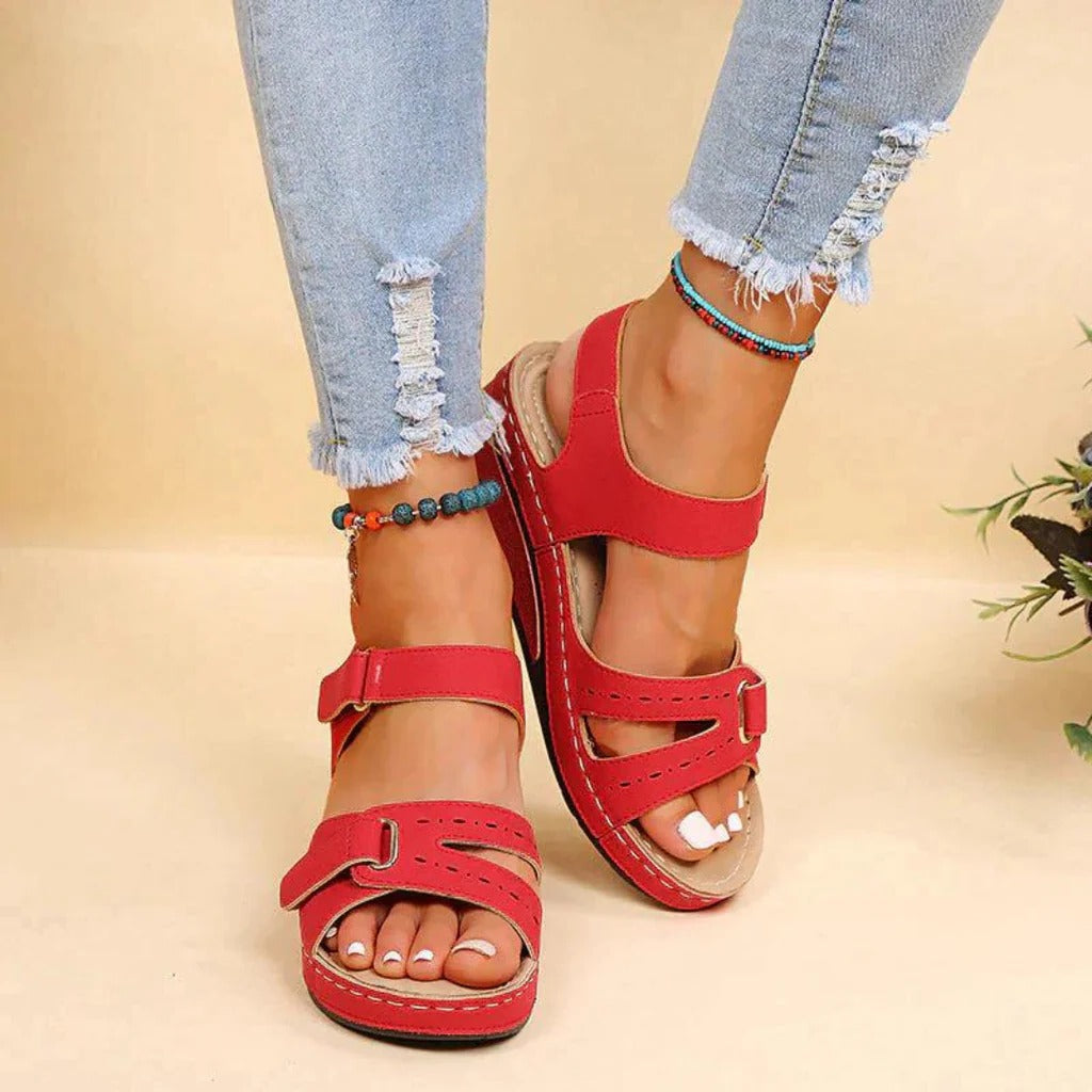 Comfortable women's orthopedic sandals with strong arch support, ideal for summer & casual wear.