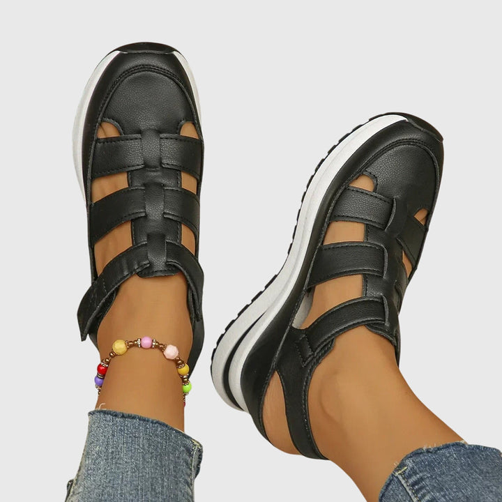 Supportive women's sandals, non-slip, with customizable arch support for healthy feet.