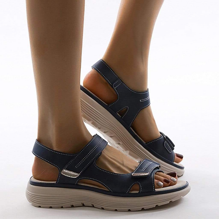 Women's orthopedic sandals with adjustable straps, designed for optimal comfort and foot pain relief.
