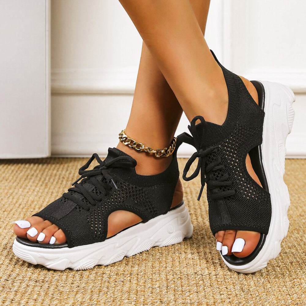 Side view of women's orthopedic sandals, showcasing arch support and cushioned sole for enhanced foot health.