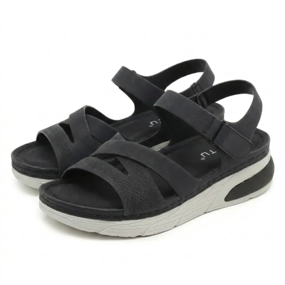 Stylish women's orthopedic sandals, featuring strong arch support & adjustable straps for everyday comfort.