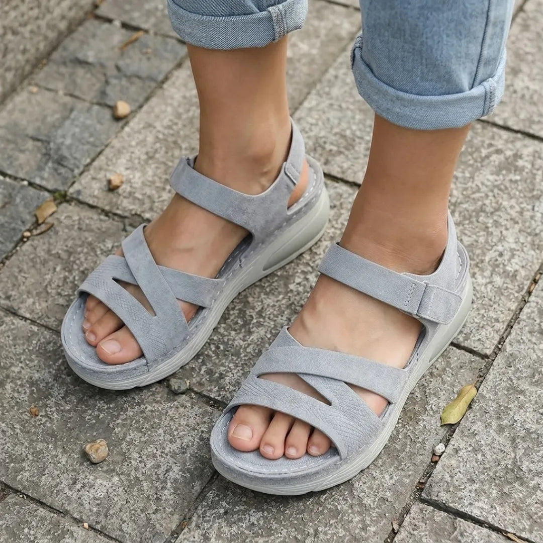 Supportive women's footwear: orthopedic arch support sandals with adjustable design for comfort.