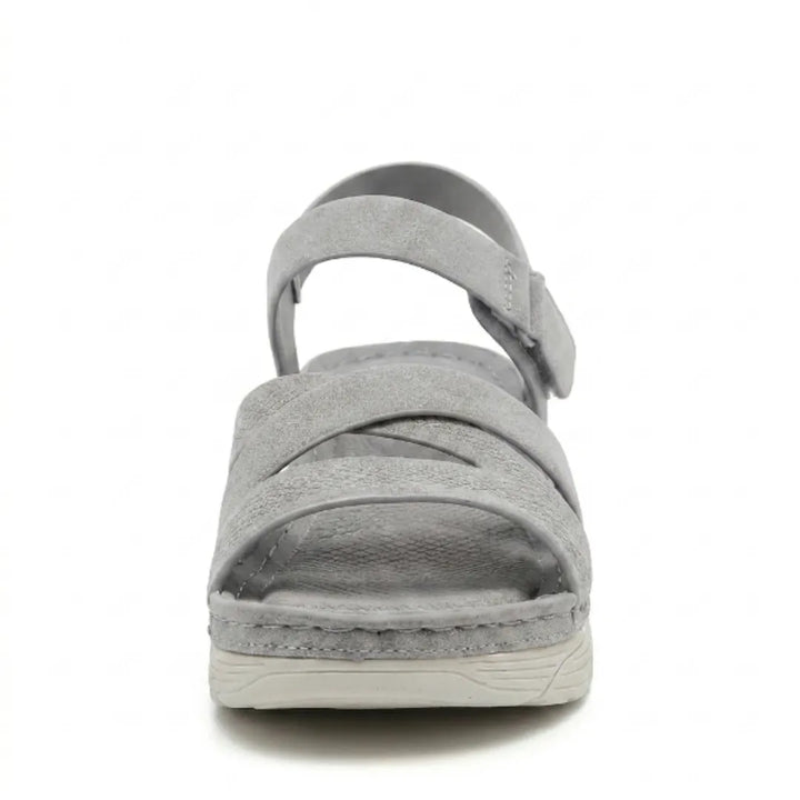 Lightweight women's sandals, designed for foot support, with orthopedic arch & adjustable fit.