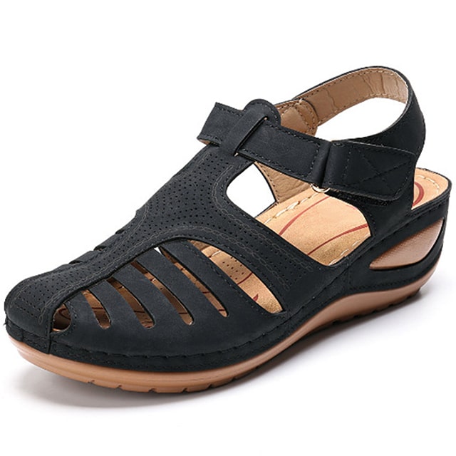 Women's orthopedic sandals with arch support, ergonomic design, and comfortable daily wear.