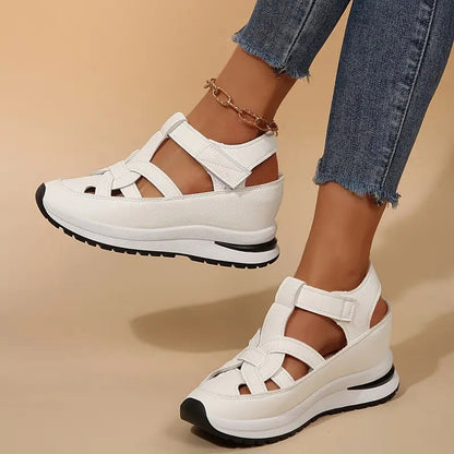 Cushioned women's orthopedic sandals, providing arch support and all-day comfort for walking.