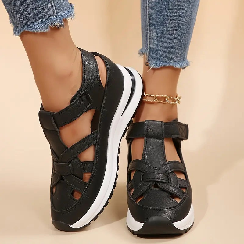 Black women's orthopedic sandals with protected toe and arch support, great for walking comfort.
