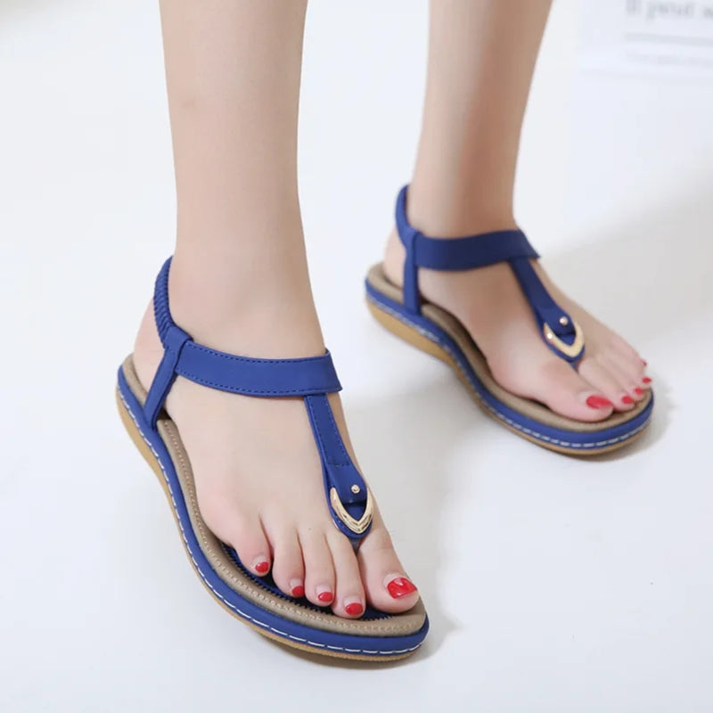 Close-up of women's orthopedic sandals, highlighting arch support & shock-absorbing sole for ultimate comfort.