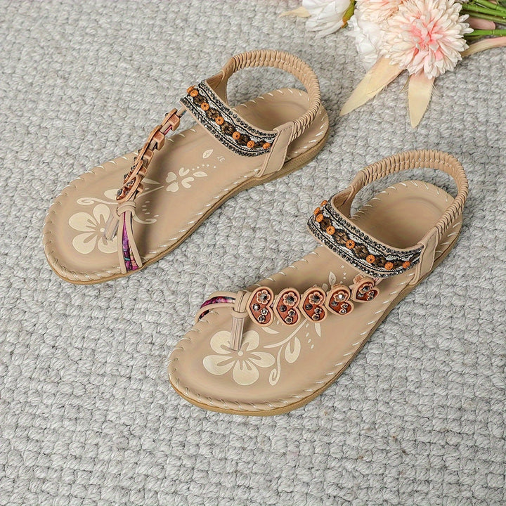 Back view of women's comfort sandals, showcasing supportive design & durable sole for all-day wear.