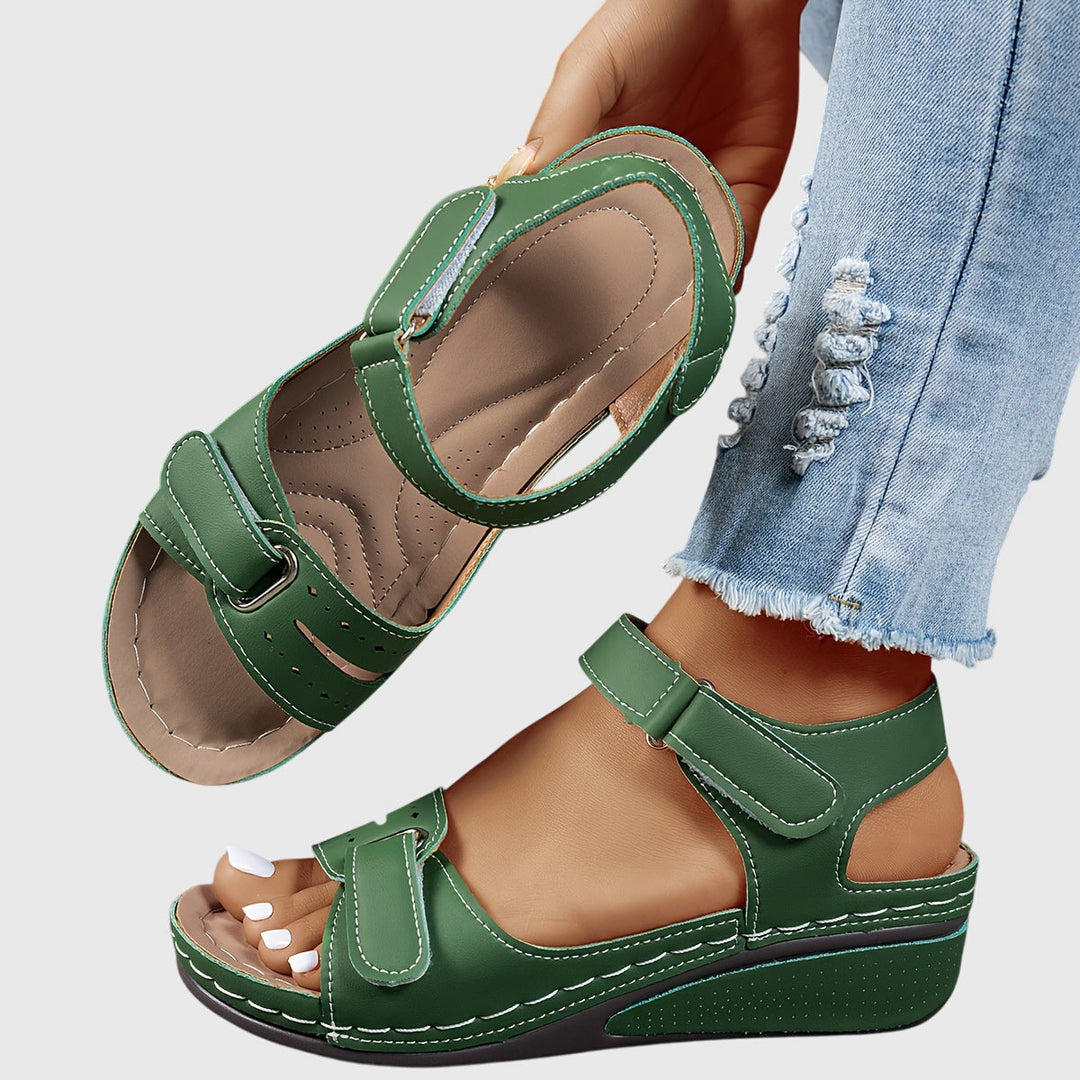 Comfortable women's walking sandals with arch support & non-slip sole. Elegant crystal detail for summer.